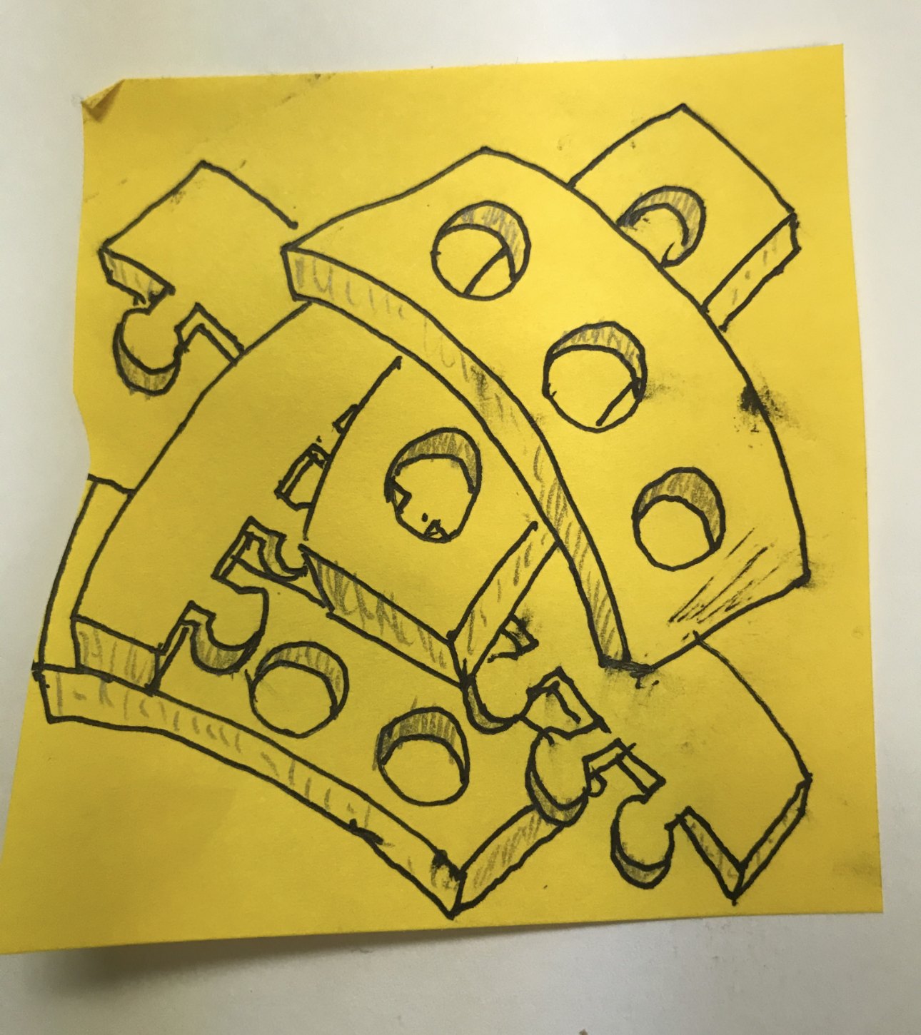 Original pencil drawing of Interlocking Humanity on a yellow Post-it note, 2021